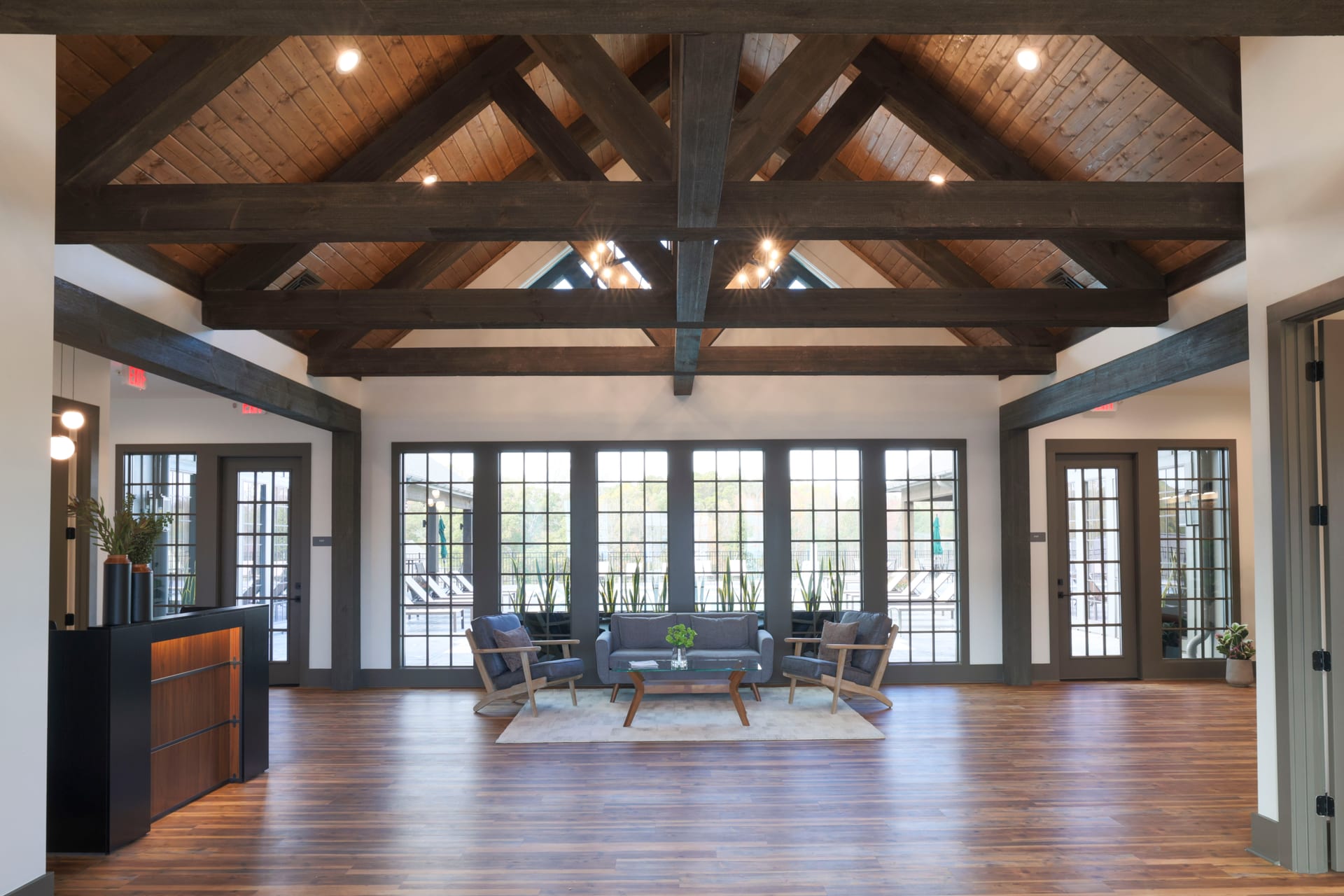 Vaulted wood ceiling and exposed beams crown a welcoming lobby lounge.